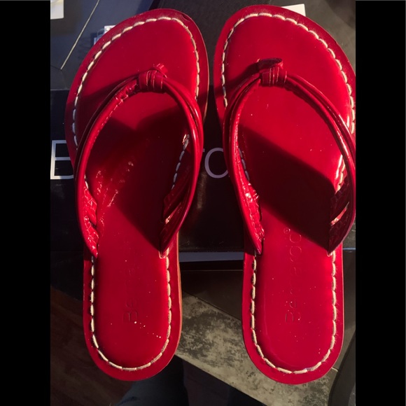 red patent leather flip flops